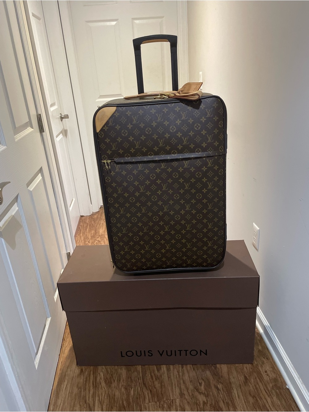 Louis Vuitton Brown Monogram Carry-On with Tan Leather Trim
Size 55
